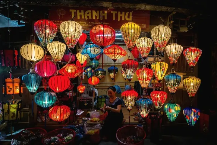 A lantern stall lit up at night